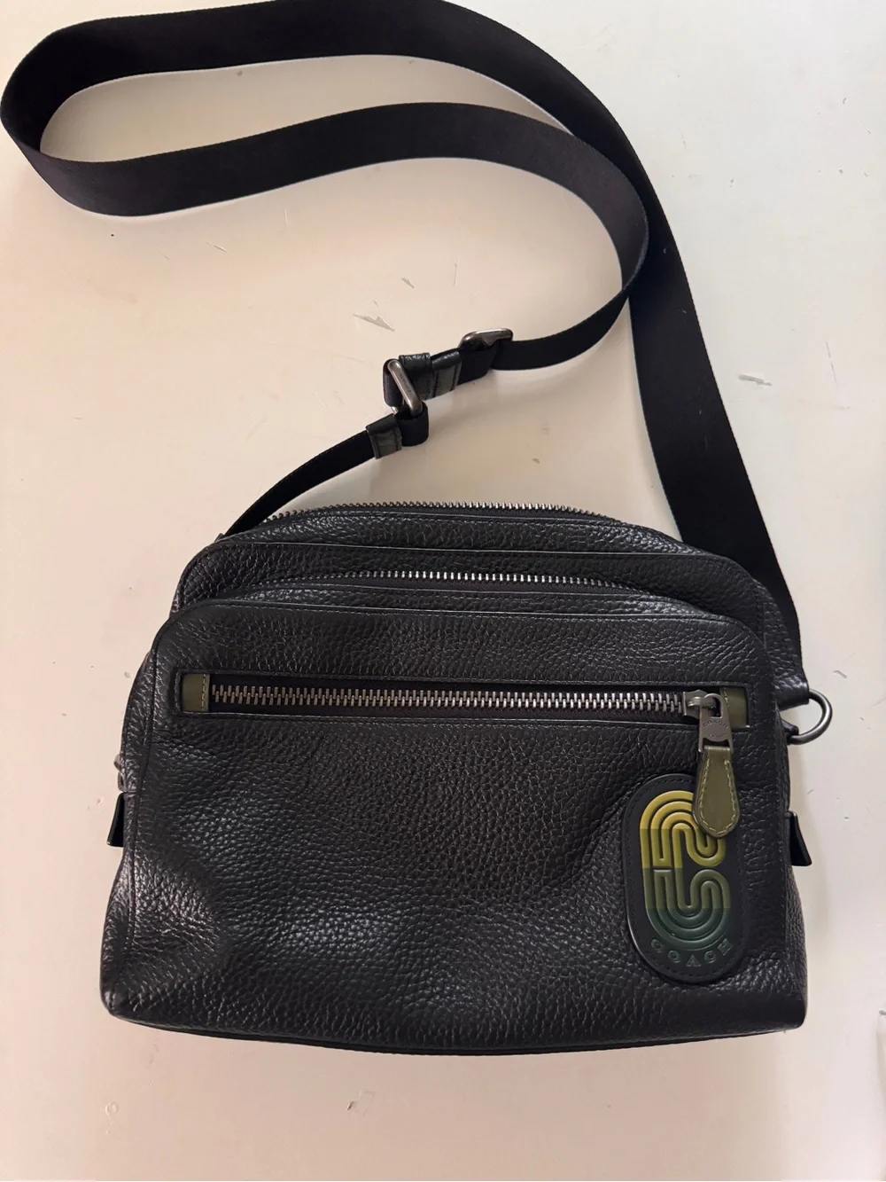 Coach Black Pebbled Leather Messenger Crossbody with Green Accent Tag